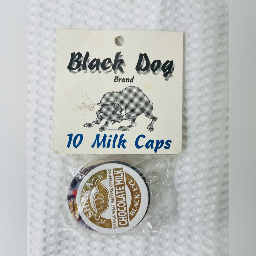 Black Dog milk caps pogs football Shaka black eye chocolate milk